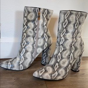 Snake print ankle booties with gold zipper